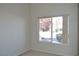 Bright bedroom with large window overlooking a park-like view at 4727 Wild Draw Dr, North Las Vegas, NV 89031