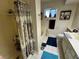 Bathroom with a shower, toilet, tub, and vanity, providing a functional layout at 611 E Fairway Rd, Henderson, NV 89015