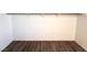 Walk-in closet with modern floors, rod and shelf at 611 E Fairway Rd, Henderson, NV 89015