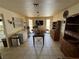 This dining room features tile floors, a large table, and plenty of natural light at 611 E Fairway Rd, Henderson, NV 89015