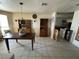 Inviting dining room with tile flooring and classic wooden furniture at 611 E Fairway Rd, Henderson, NV 89015