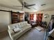 Cozy living room with comfortable seating, barn-door design and bright natural lighting at 611 E Fairway Rd, Henderson, NV 89015