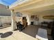 Covered outdoor patio area providing space for recreation and storage at 611 E Fairway Rd, Henderson, NV 89015
