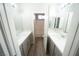 Dual sink bathroom with modern fixtures and gray cabinets at 5713 Heineken Dr, North Las Vegas, NV 89031