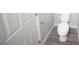 Modern bathroom with white toilet and neutral wall color at 5713 Heineken Dr, North Las Vegas, NV 89031