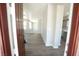 Bright entryway featuring hardwood flooring and a view into the living spaces at 5713 Heineken Dr, North Las Vegas, NV 89031