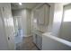 Hallway with built-in cabinets and modern flooring at 5713 Heineken Dr, North Las Vegas, NV 89031