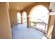 Covered front porch with decorative railing, providing a welcoming outdoor space at 5713 Heineken Dr, North Las Vegas, NV 89031
