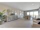 Modern dining area with large windows and contemporary furnishings at 1469 Dragon Stone Pl, Henderson, NV 89012