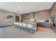 Modern kitchen with sleek cabinetry, quartz countertops, and island seating at 1469 Dragon Stone Pl, Henderson, NV 89012