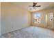 Spacious bedroom with ceiling fan and large window at 10001 Peace Way # 2324, Las Vegas, NV 89147