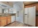 Kitchen with light wood cabinets and white appliances at 10001 Peace Way # 2324, Las Vegas, NV 89147