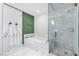 Luxurious bathroom featuring a soaking tub, glass-enclosed shower, and modern fixtures at 4471 Dean Martin Dr # 2205, Las Vegas, NV 89103