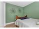 Cozy bedroom with a bed, wood floors, and stylish wall decor at 4471 Dean Martin Dr # 2205, Las Vegas, NV 89103