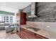 Bright kitchen with sleek appliances, modern countertops, and an open layout connecting to the living area with city views at 4471 Dean Martin Dr # 2205, Las Vegas, NV 89103
