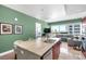 Well-appointed kitchen with an island, counter seating, and seamless connection to the living space and expansive windows at 4471 Dean Martin Dr # 2205, Las Vegas, NV 89103
