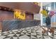 Stylish lobby with black and white marble floors, grand marble reception desk, and attractive decorative features at 4471 Dean Martin Dr # 2205, Las Vegas, NV 89103
