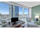 Bright office space offering panoramic city views, built-in desk, and modern design at 4471 Dean Martin Dr # 2205, Las Vegas, NV 89103