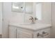 A bathroom sink with stainless steel faucet and chrome towel rack at 1161 Gecko Rd, Henderson, NV 89002