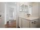 Bathroom sink with views to the hallway and another bathroom at 1161 Gecko Rd, Henderson, NV 89002