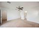 View of a large bedroom with a ceiling fan and access to the bathroom and closet at 1161 Gecko Rd, Henderson, NV 89002