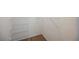 An empty walk-in closet featuring metal shelving and beige carpet at 1161 Gecko Rd, Henderson, NV 89002