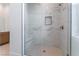 Large walk-in shower with marble tile and built-in seat at 8965 Coastal Oaks St, Las Vegas, NV 89166