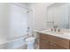 Clean bathroom with a bathtub and vanity at 8965 Coastal Oaks St, Las Vegas, NV 89166