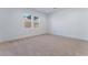 Spacious bedroom with carpeted floors and neutral walls at 8965 Coastal Oaks St, Las Vegas, NV 89166