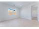 Bright bedroom with large windows and tile floors at 8965 Coastal Oaks St, Las Vegas, NV 89166