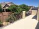 Outdoor balcony with iron railing and views of the surrounding neighborhood at 7421 Old Compton St, Las Vegas, NV 89166