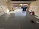 Attached two car garage featuring epoxy floors and plenty of space for storage at 7421 Old Compton St, Las Vegas, NV 89166