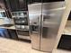 Kitchen appliances featuring a stainless steel refrigerator, oven and gas cooktop at 7421 Old Compton St, Las Vegas, NV 89166