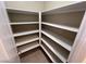 Corner walk-in pantry with ample shelving at 7421 Old Compton St, Las Vegas, NV 89166