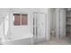 Bathroom featuring soaking tub, walk-in shower, and separate toilet area at 106 Via Franello, Henderson, NV 89011