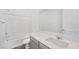 Clean bathroom with grey vanity and a bathtub at 106 Via Franello, Henderson, NV 89011