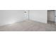 Simple bedroom with grey carpet and an attached closet at 106 Via Franello, Henderson, NV 89011
