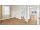 Comfortable bedroom leading to an ensuite bathroom, with new flooring and abundant natural light at 10001 Peace Way # 2322, Las Vegas, NV 89147