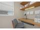 Efficient home office area with built in storage, desk and a window for natural light at 10001 Peace Way # 2322, Las Vegas, NV 89147