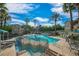 Community pool with lots of seating, lovely waterfall feature, and well-maintained landscaping at 10001 Peace Way # 2322, Las Vegas, NV 89147