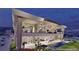 Modern home boasting a pool, outdoor lounge, and scenic mountain views at 616 Scenic Rim Dr, Henderson, NV 89012