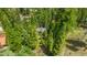 Aerial view of an A-frame home surrounded by mature trees at 4205 Mont Blanc Way, Las Vegas, NV 89124