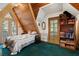 Unique A-frame bedroom featuring wood ceilings, a balcony, and natural light at 4205 Mont Blanc Way, Las Vegas, NV 89124