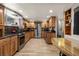 Well-equipped kitchen with stainless steel appliances, granite counters, and light wood cabinetry at 4205 Mont Blanc Way, Las Vegas, NV 89124