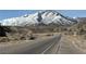 Scenic road leading to snow-capped mountains, inviting exploration and breathtaking views along the way at 4205 Mont Blanc Way, Las Vegas, NV 89124