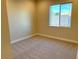 Spacious bedroom with neutral walls and carpet at 5569 Artex Ave, Las Vegas, NV 89139