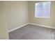 Bright bedroom with neutral walls and carpet at 5569 Artex Ave, Las Vegas, NV 89139