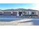 Single-story home with two-car garage, neutral color scheme, and desert landscaping at 5569 Artex Ave, Las Vegas, NV 89139