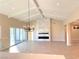 Spacious living room featuring a marble fireplace and chandelier at 5569 Artex Ave, Las Vegas, NV 89139