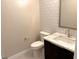 Stylish bathroom with modern vanity and patterned tile at 9207 Sandula Ct, Las Vegas, NV 89139